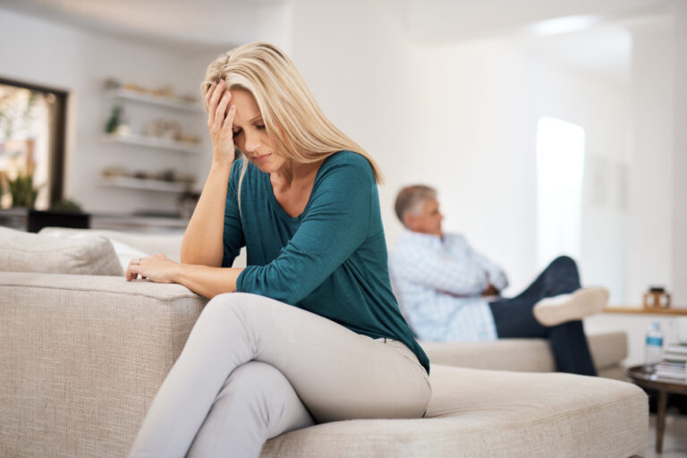 Couch, couple and fight in home for annoyed, divorce or married people for argument. Disagreement, sofa and lounge for frustrated woman, affair or emotion in toxic relationship with mature partner.